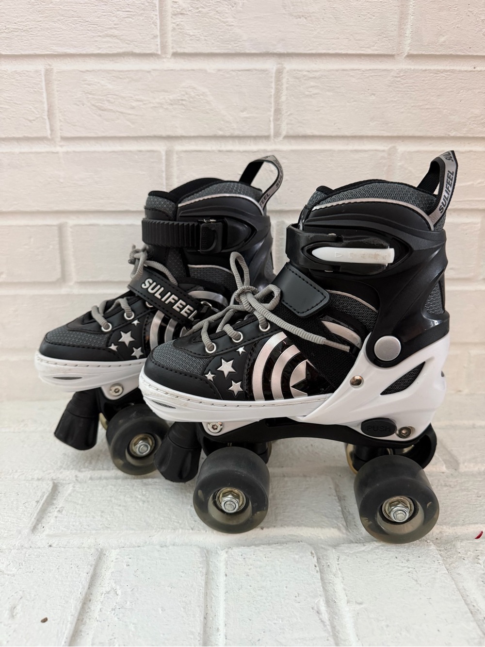 Kids Black & White Quad Roller Skates with Star Accent